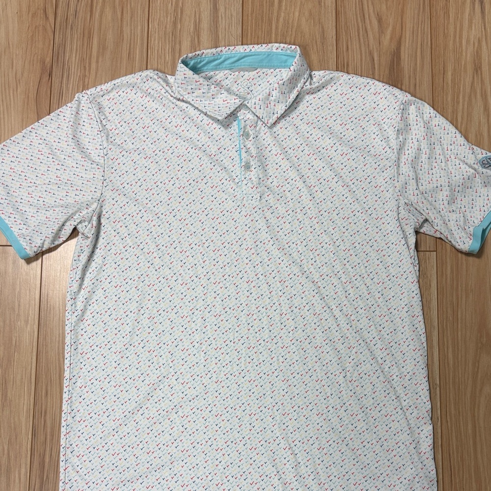 Stylish White Polo with Blue and Red Accents